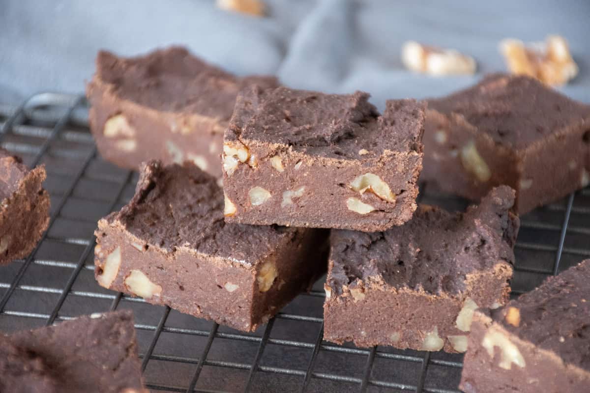 Brownies, cut, on a cooling rack.