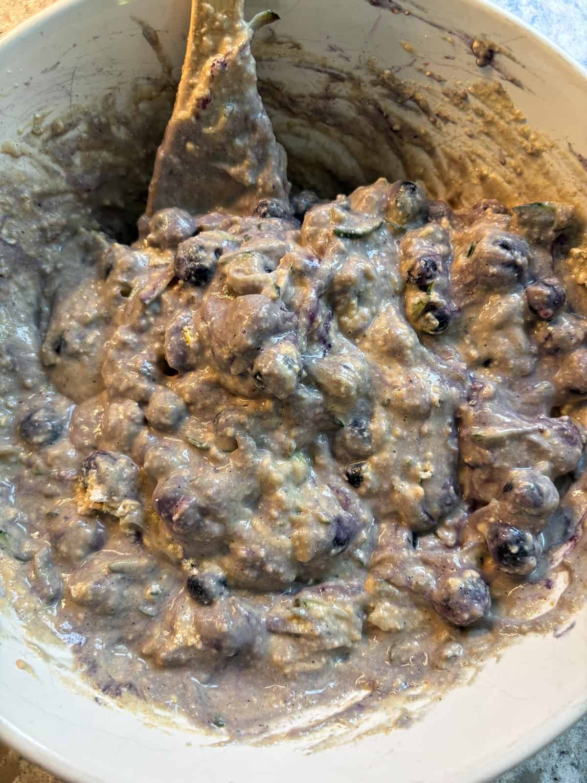 Blueberries folded into the muffin batter.