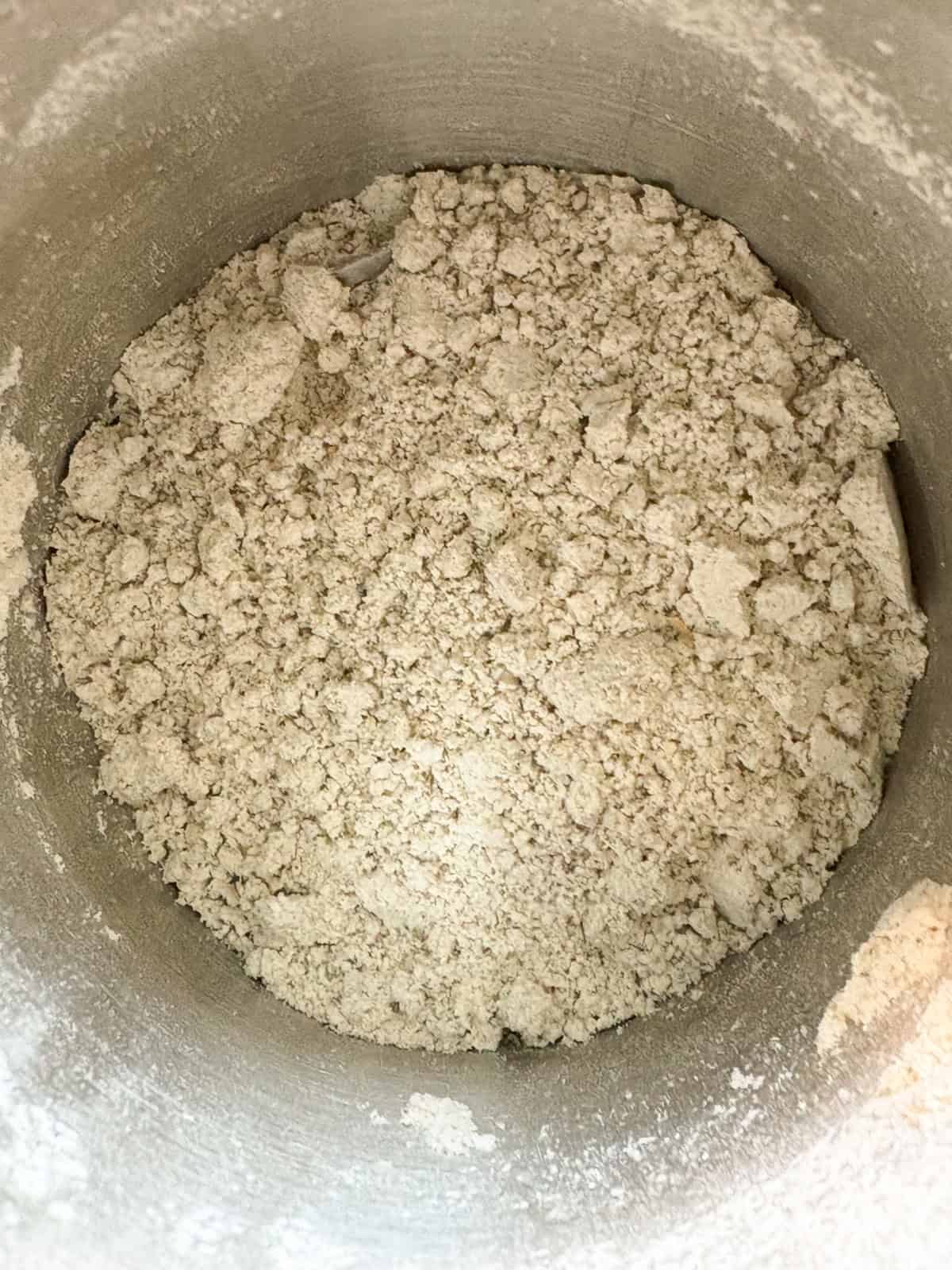 Lavender buds and a spoonful of flour ground in a spice grinder.
