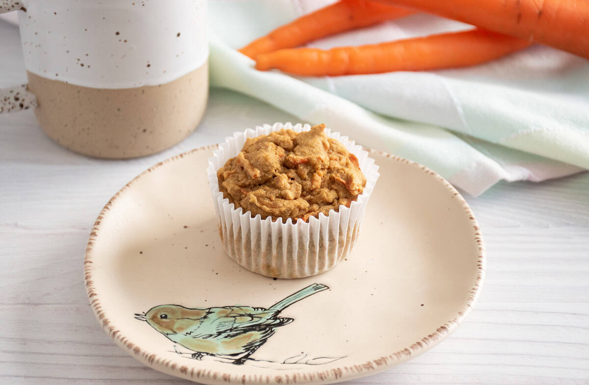 A muffin on a plate.