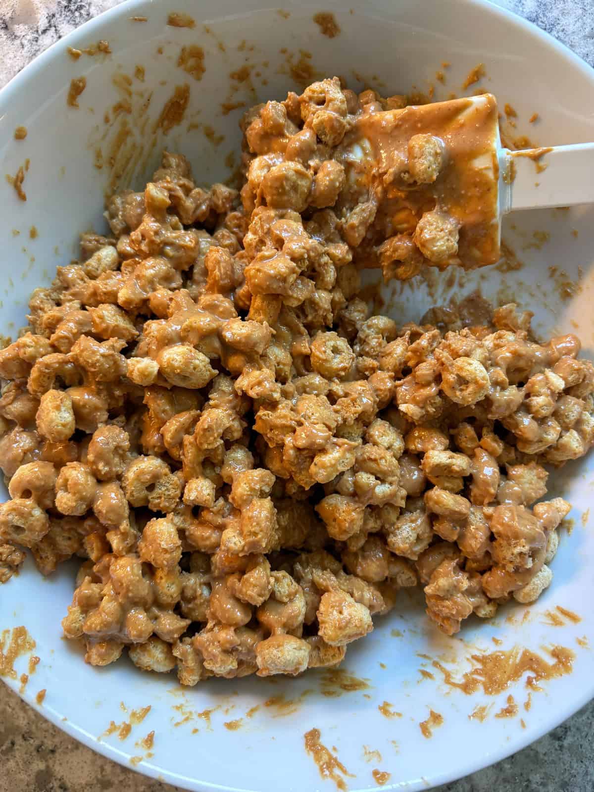 Cereal mixed with peanut butter.