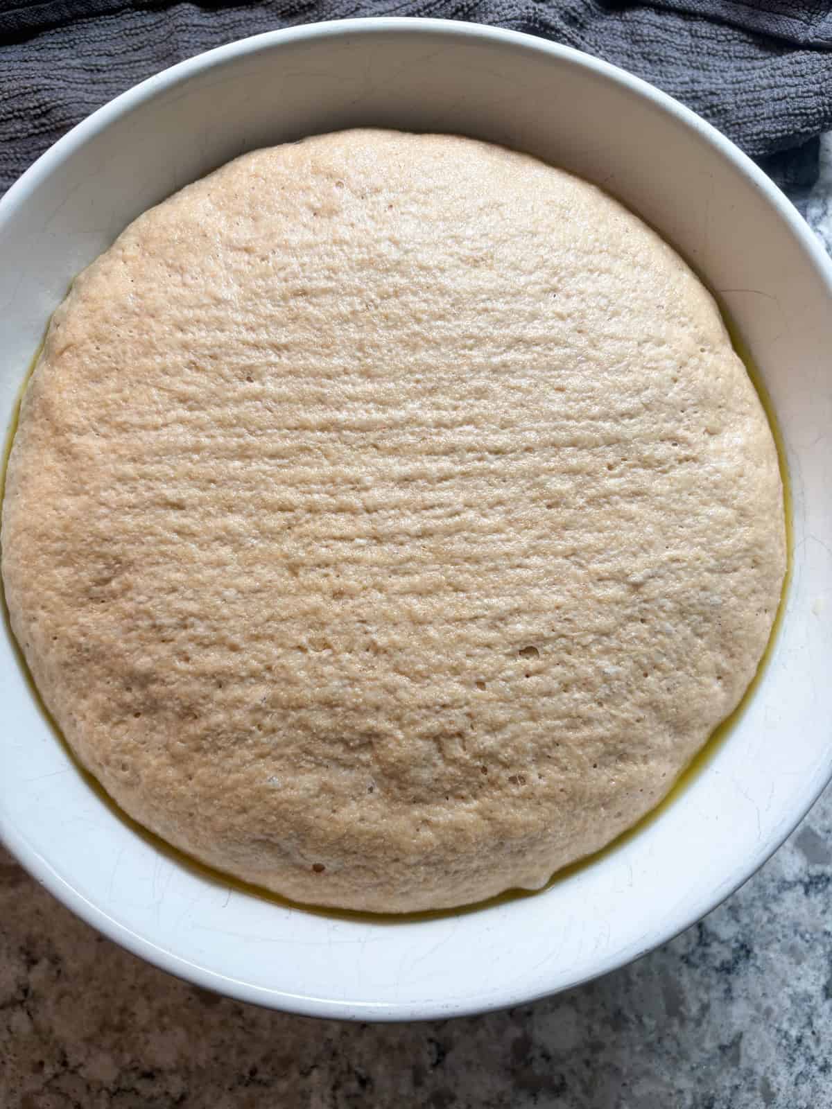 Dough after rising in a warm place for an hour.