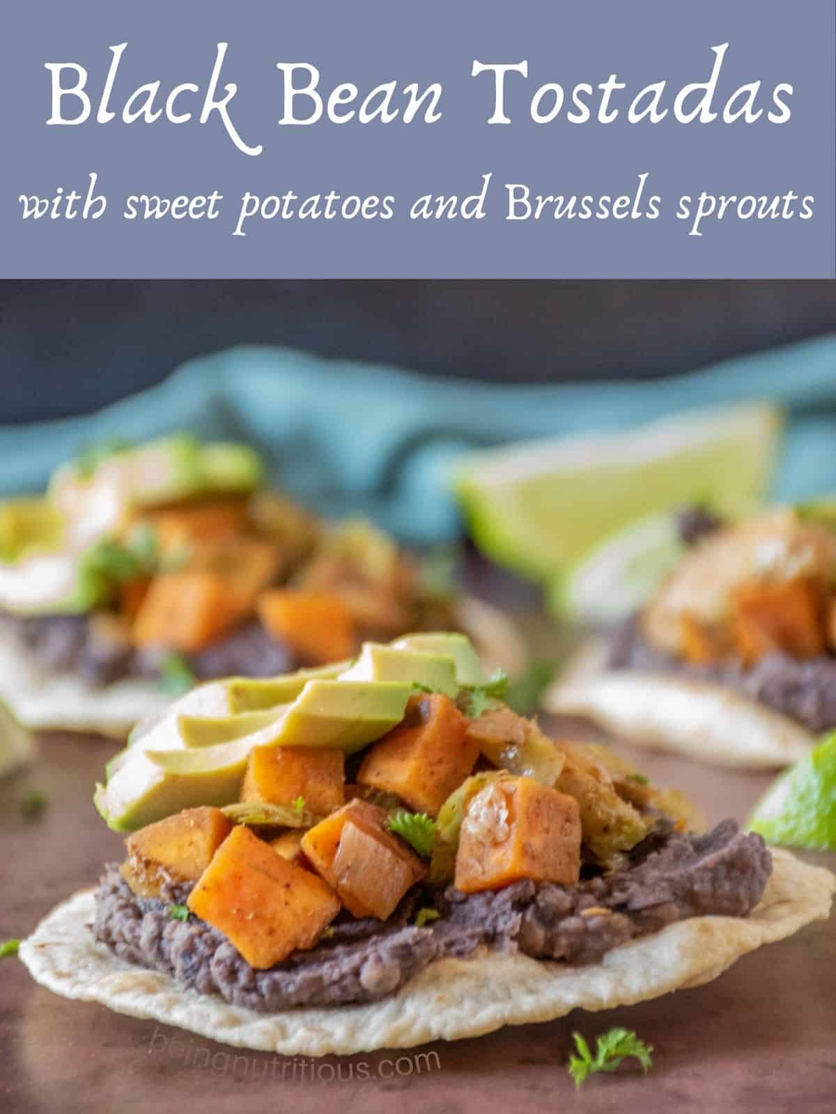 A side image of a tostada. Text overlay: Black Bean Tostadas with sweet potatoes and Brussels sprouts.