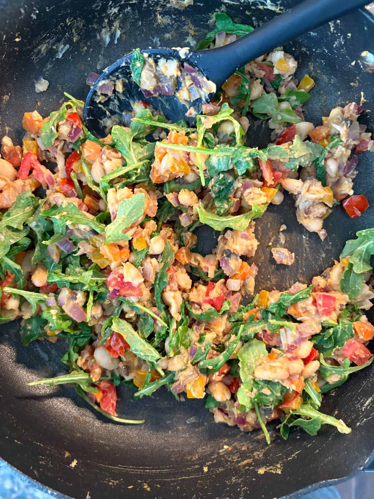 Finished vegetable hash, in a sauté pan.