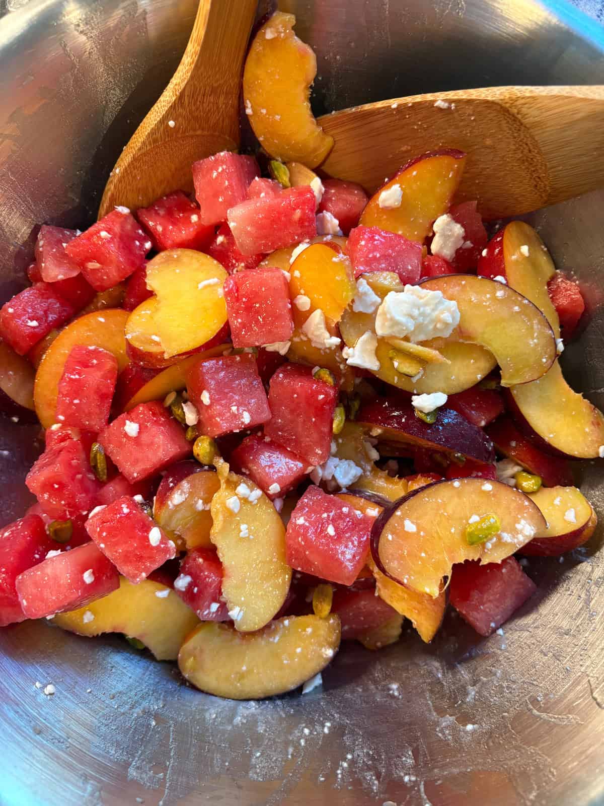 Fruit salad tossed together.
