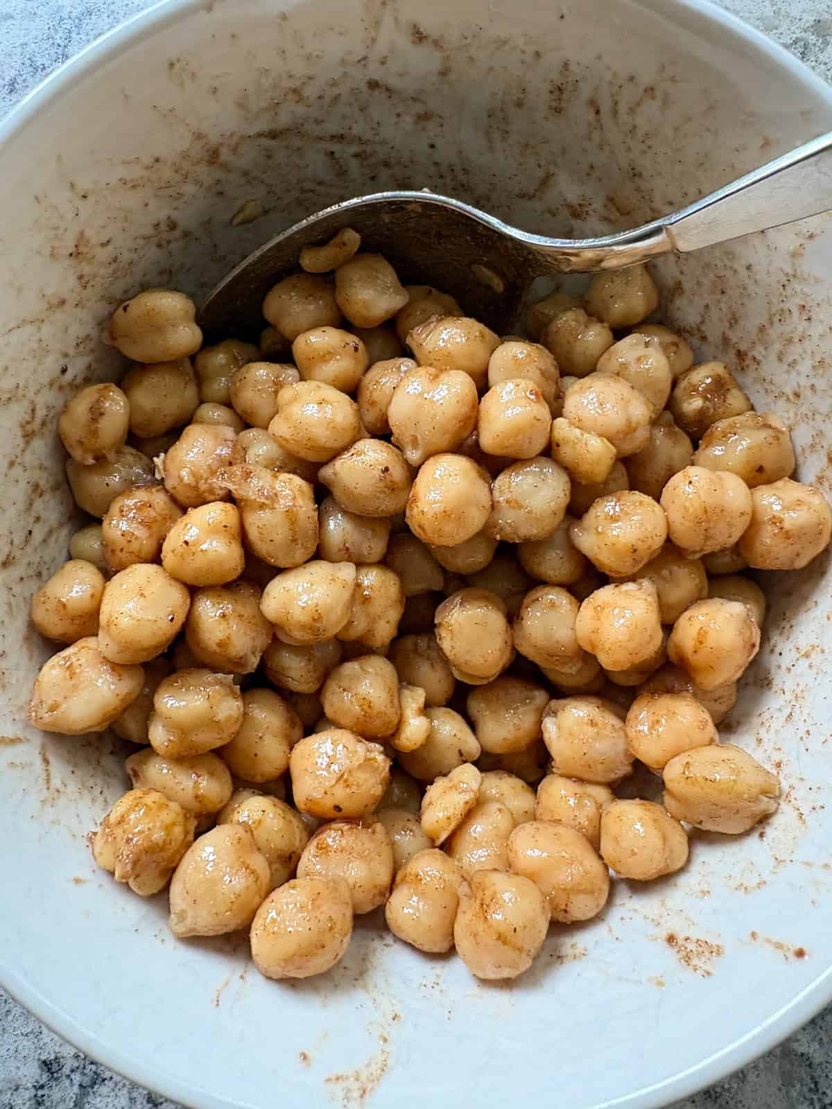 Chickpeas tossed in oil and spices.