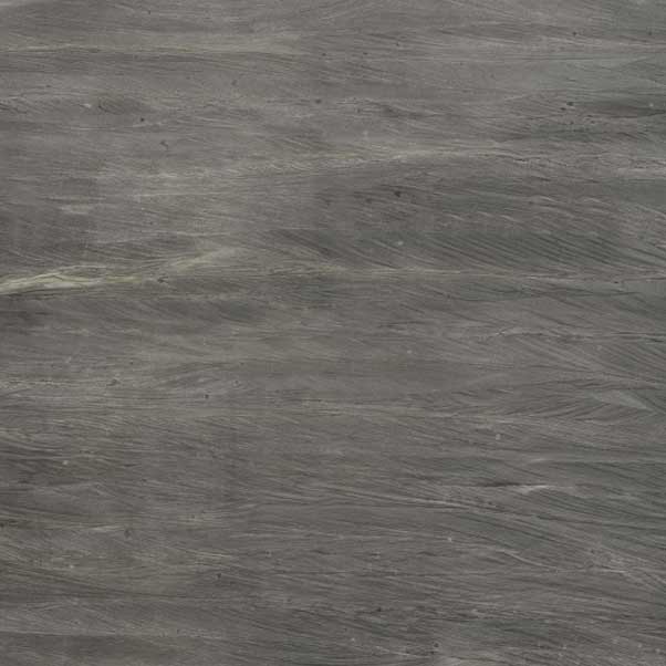 Dark gray stone surface with flowing lighter bands and fine pale veins.