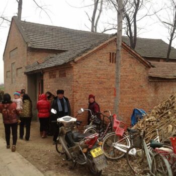 gathering outside a meeting house
