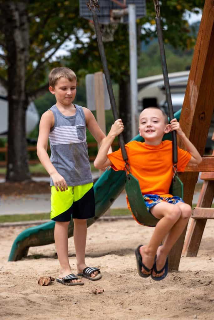 Boys swinging