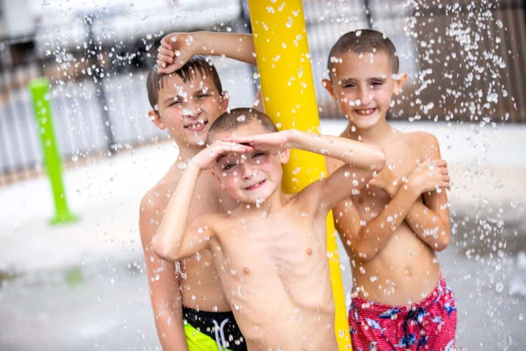 Kids playing on splash pad