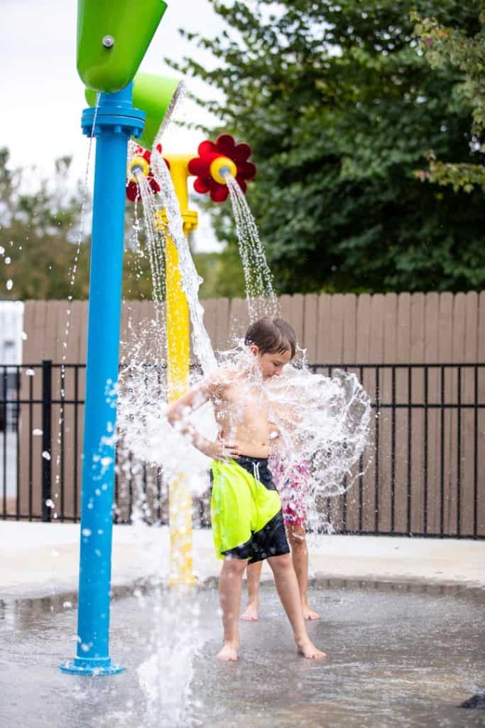 Kids playing on splash pad