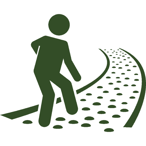 A man walking down a path.