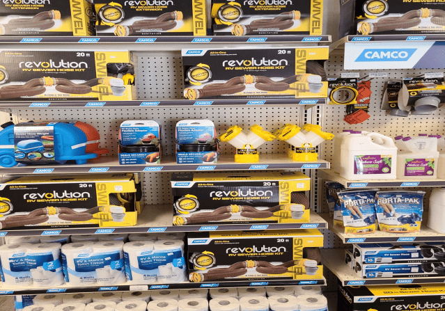 A shelf of toilet paper in a store.
