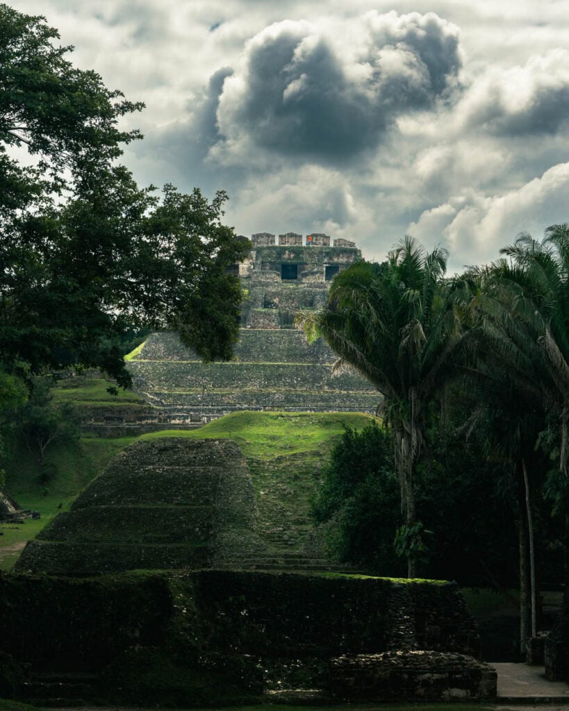 The temples of Xunatunich with storm clouds above