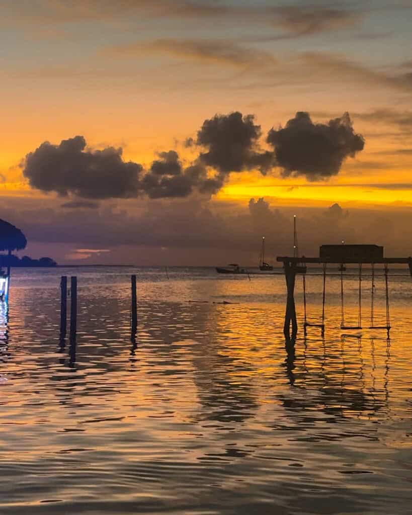 A golden sunset at stingray beach, Caye caulker, Belize