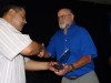 Bill Charland (right) receives a plaque on behalf of Border Partners from Principal Eduardo Esparza Rivota.