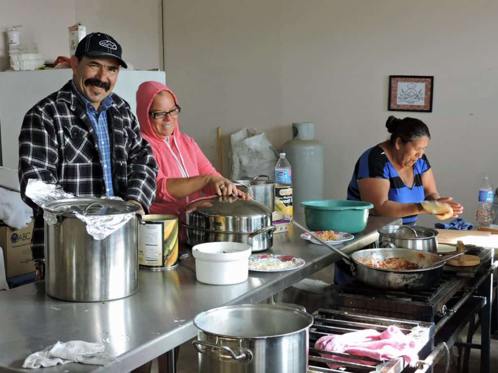 cooks prepare for lunch