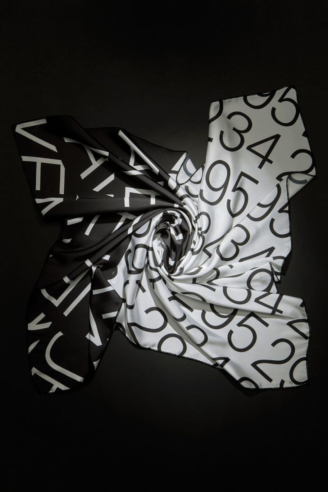 Discover How Typographic Motion Transforms Silk Scarves, Avant-Garde Wearable Art