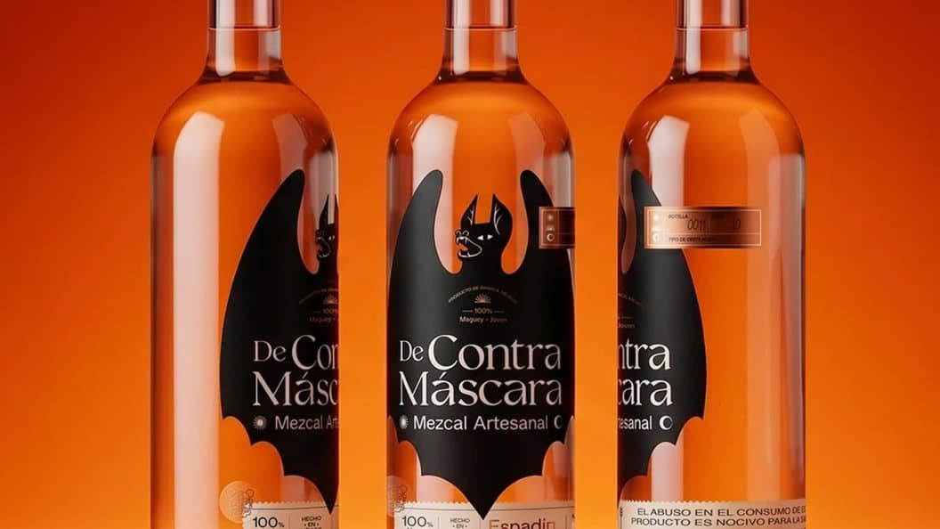 Mezcal DeContra packaging by Nani Astúa, handcrafted brand identity with bold folk art