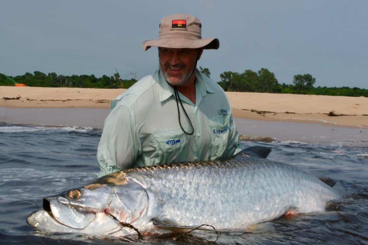 Angler holding Tarpon caught at Skimmer Island in Cabinda Angola