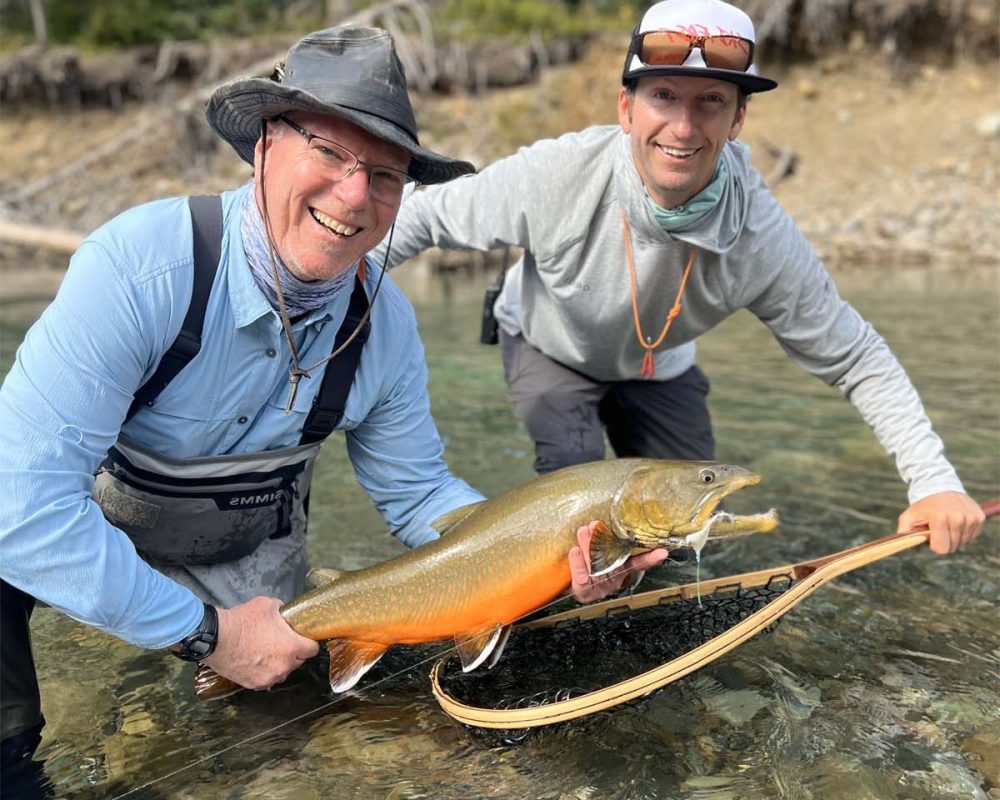 trophy bull trout caught while heli-fishing in british columbia