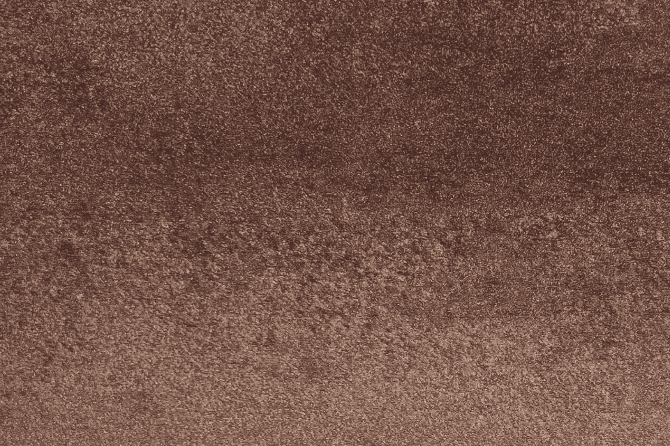 Rustfärgad, rostig metallyta med textur och små korrosionsfläckar.