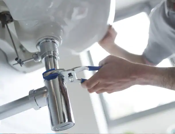 Licensed-Plumber-Tightening-Bathroom-Sink-Drain-Pipe