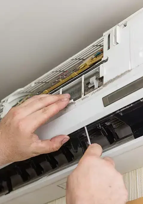 HVAC-Technician-Repairing-Indoor-Air-Conditioning-Unit