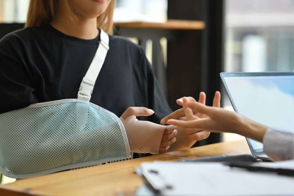 Person receiving legal advice from attorney at Canyon State Law office.