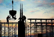construction workers working with steel and crane