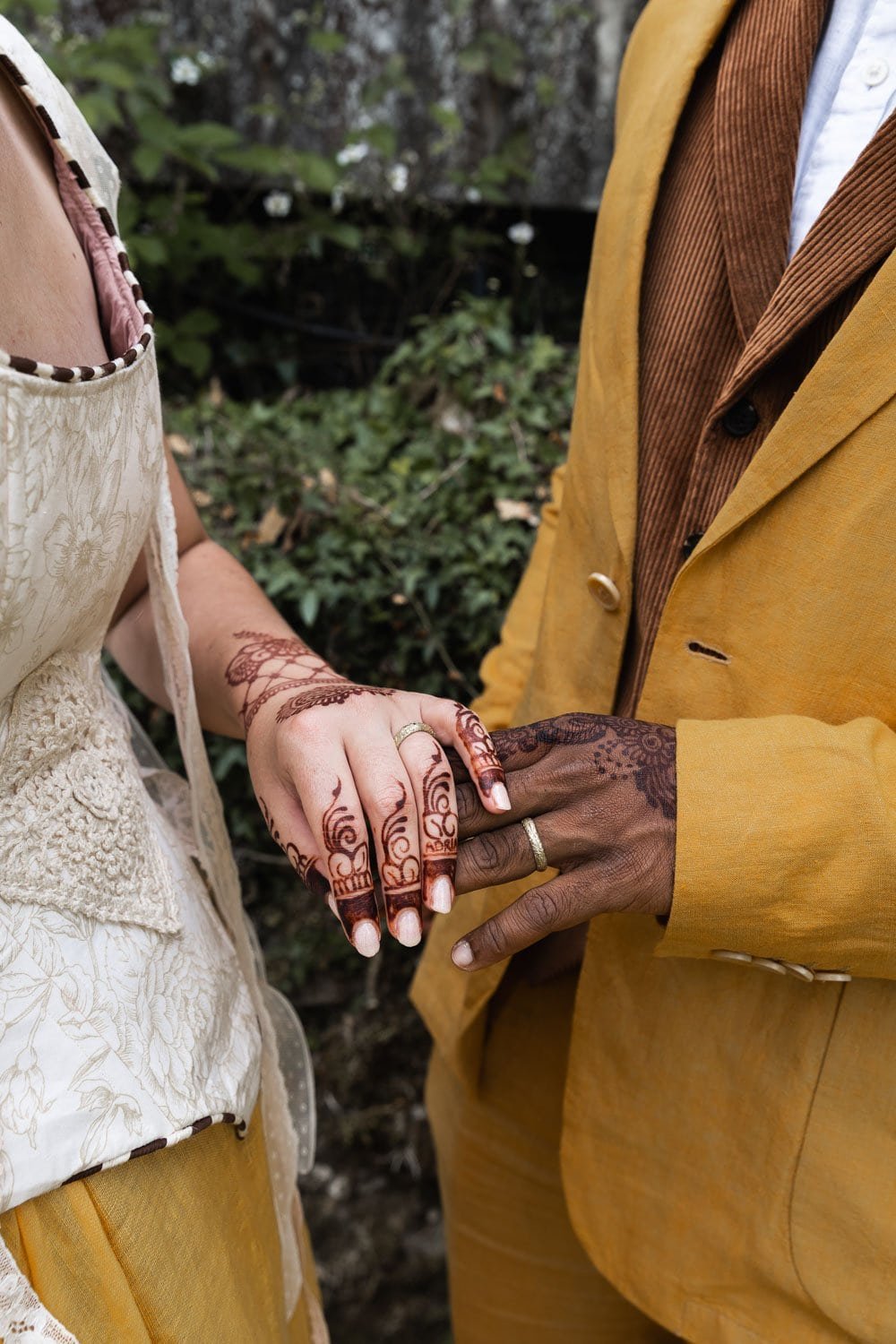 Photography of a yellow DIY wedding in a barn by London photographer Lauren Squire