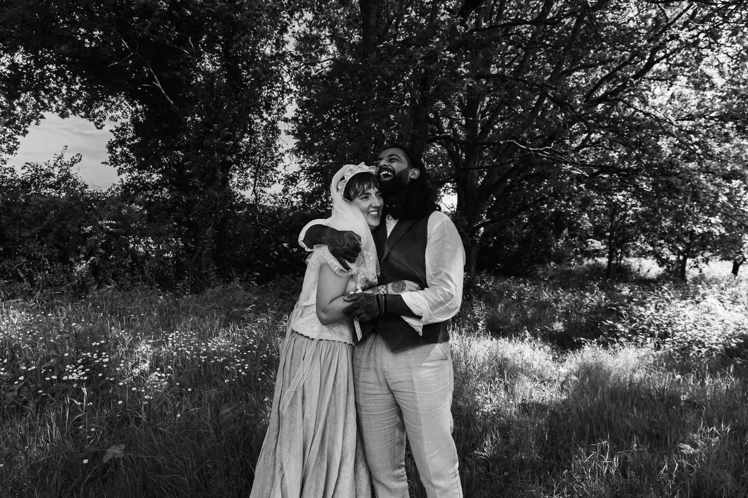 Photography of a yellow DIY wedding in a barn by London photographer Lauren Squire