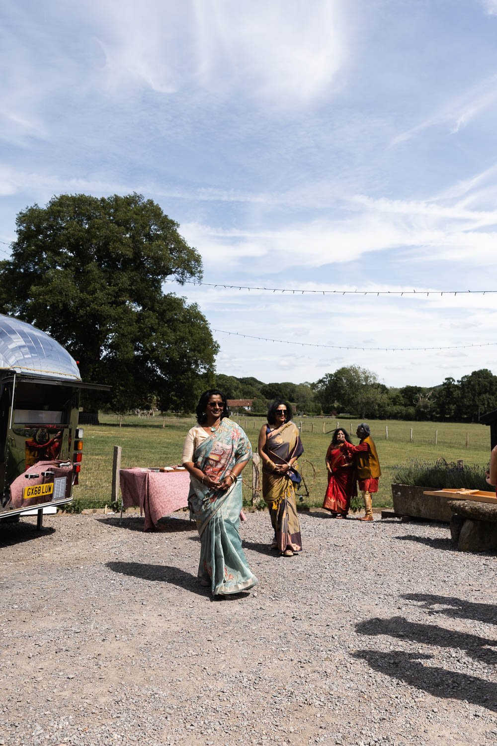 Photography of a yellow DIY wedding in a barn by London photographer Lauren Squire