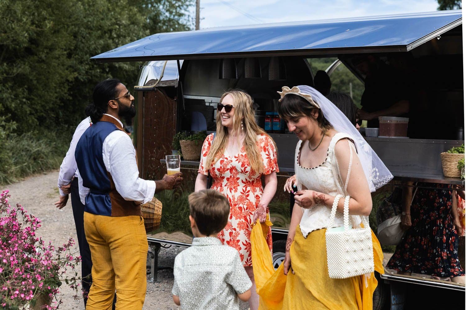 Photography of a yellow DIY wedding in a barn by London photographer Lauren Squire