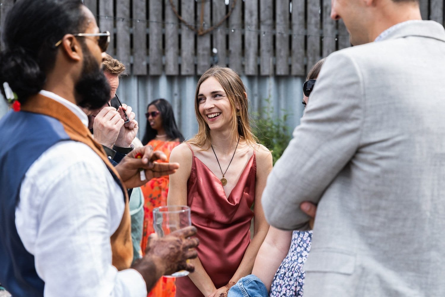 Photography of a yellow DIY wedding in a barn by London photographer Lauren Squire