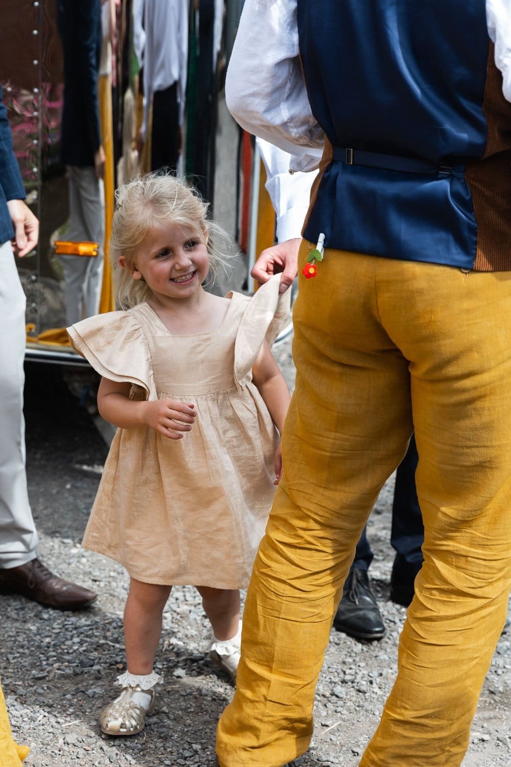 Photography of a yellow DIY wedding in a barn by London photographer Lauren Squire