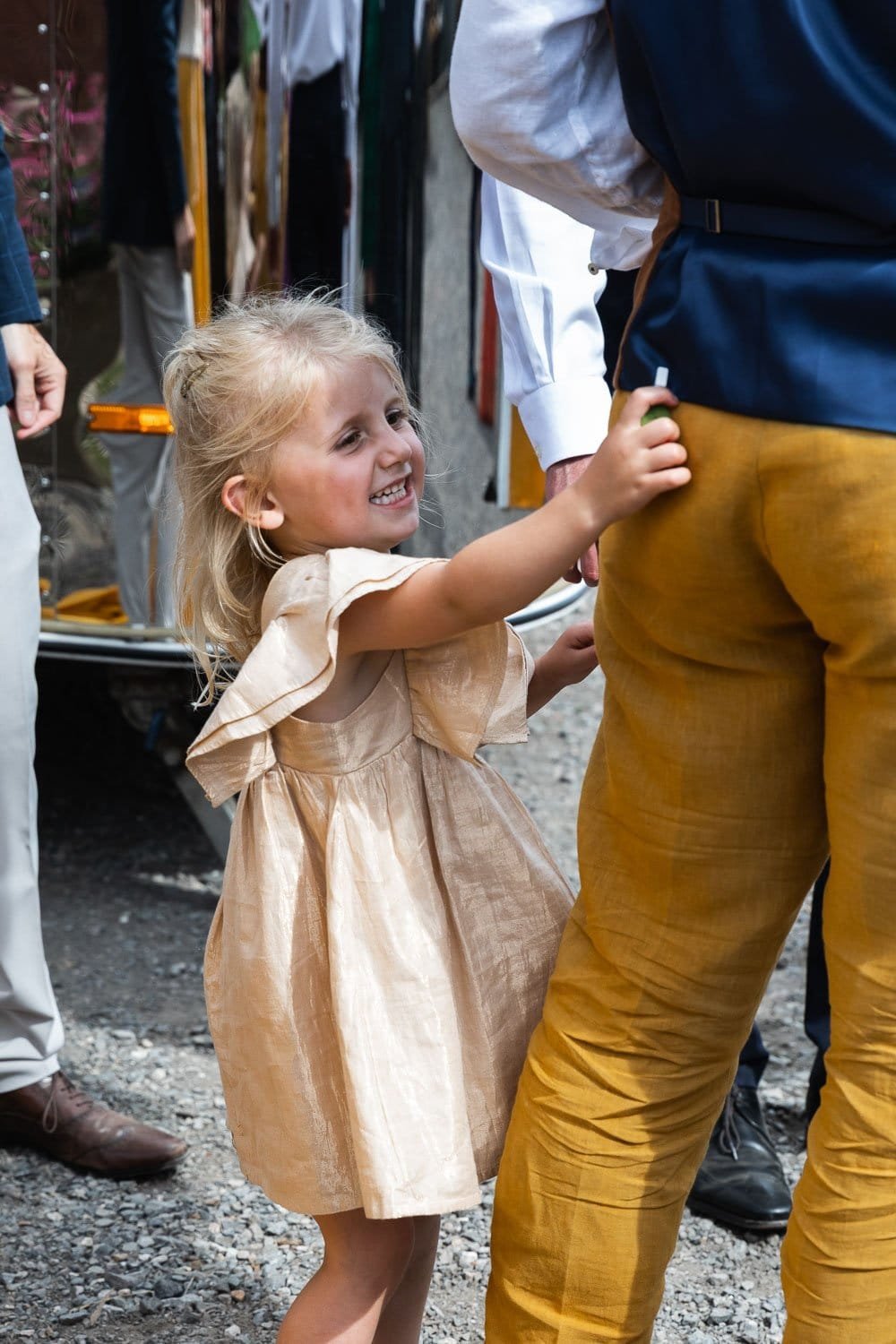 Photography of a yellow DIY wedding in a barn by London photographer Lauren Squire
