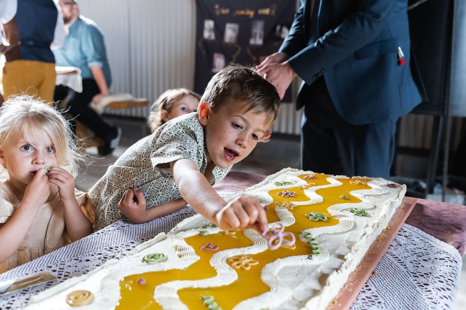 Photography of a yellow DIY wedding in a barn by London photographer Lauren Squire