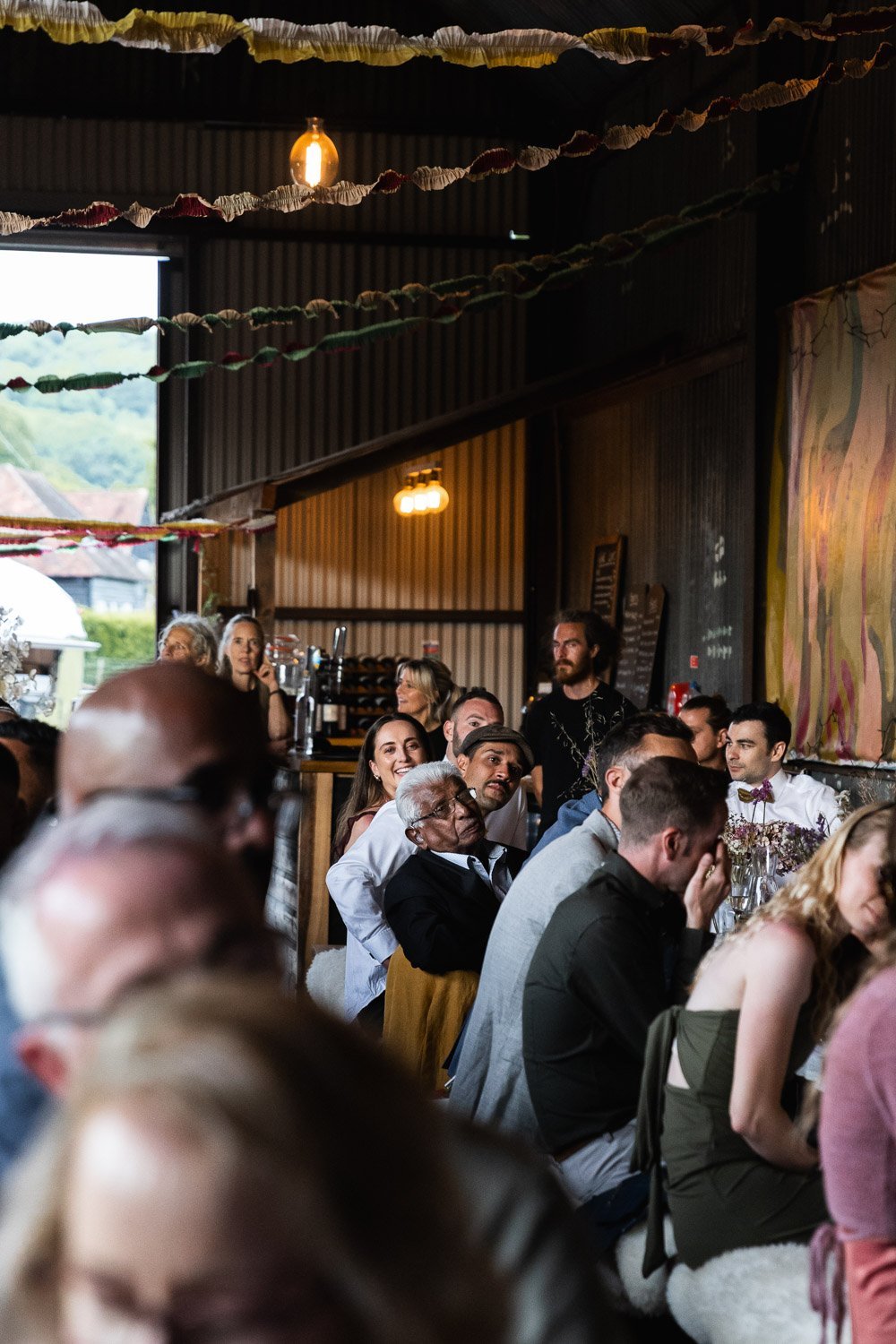 Photography of a yellow DIY wedding in a barn by London photographer Lauren Squire