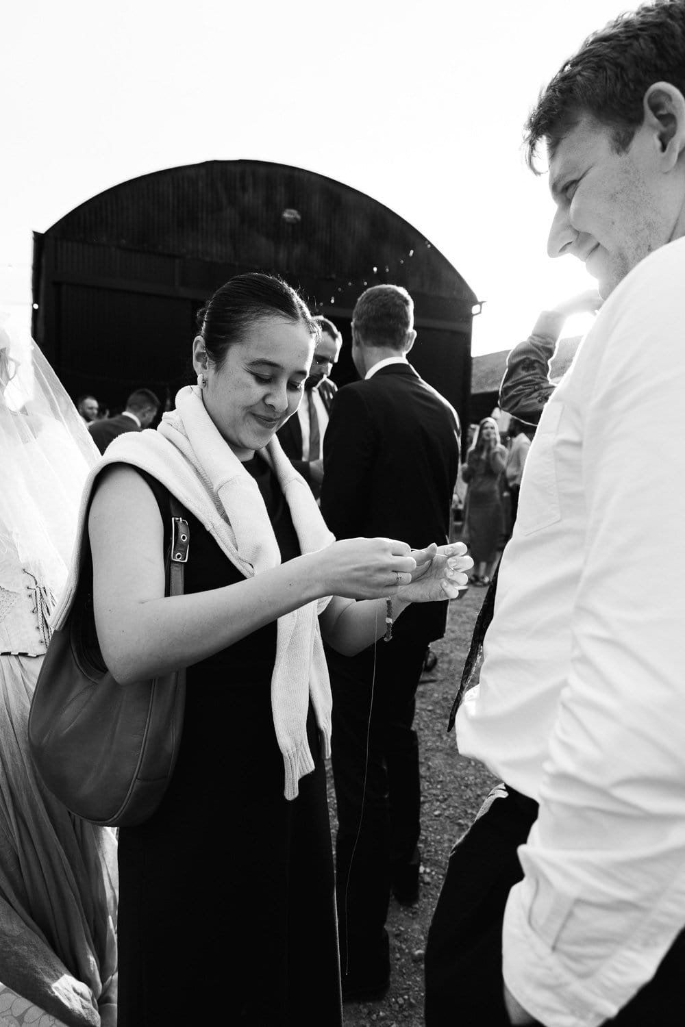 Photography of a yellow DIY wedding in a barn by London photographer Lauren Squire