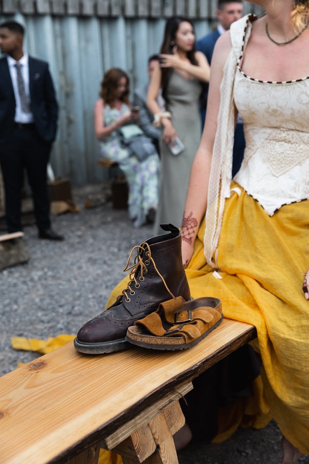 Photography of a yellow DIY wedding in a barn by London photographer Lauren Squire