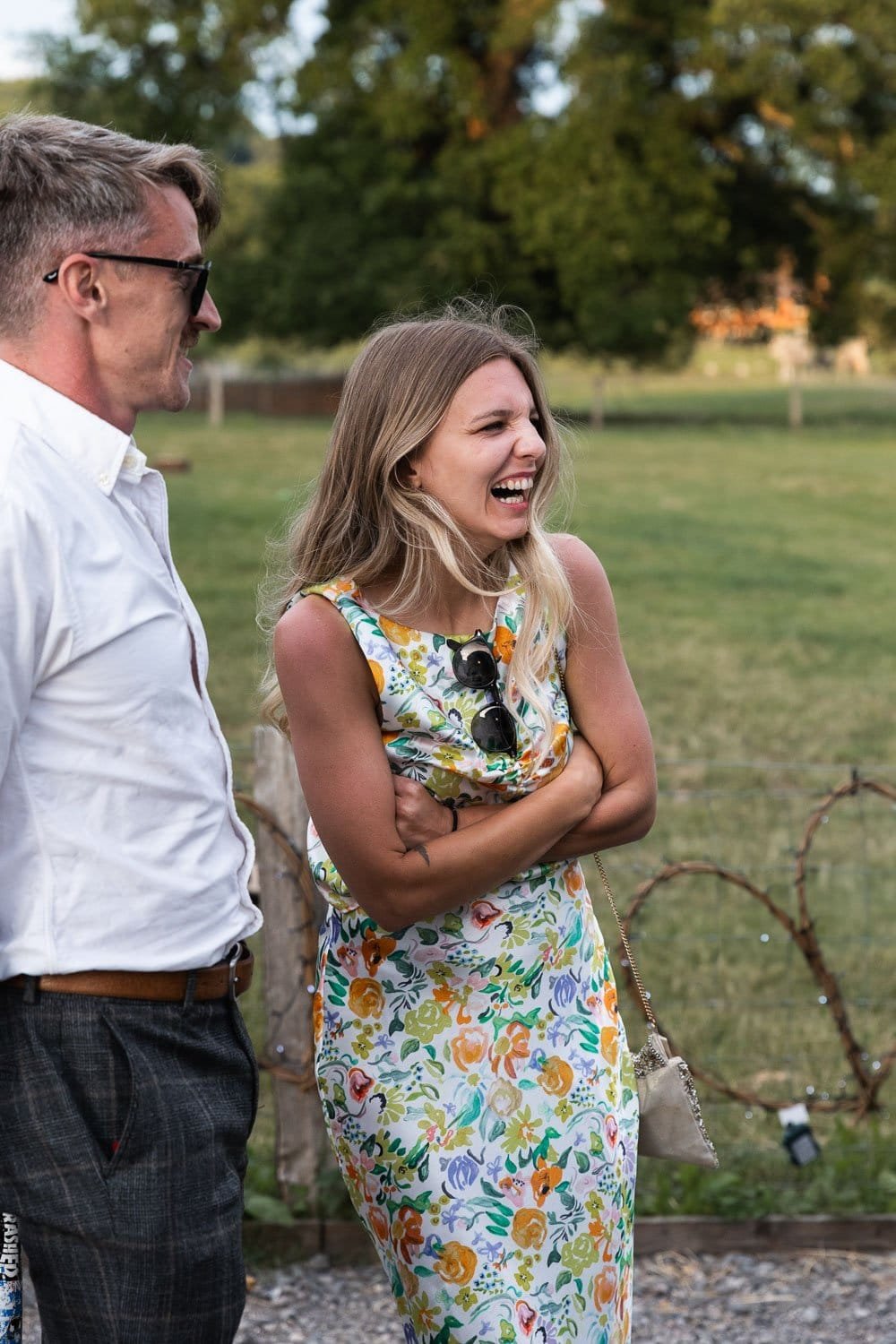 Photography of a yellow DIY wedding in a barn by London photographer Lauren Squire