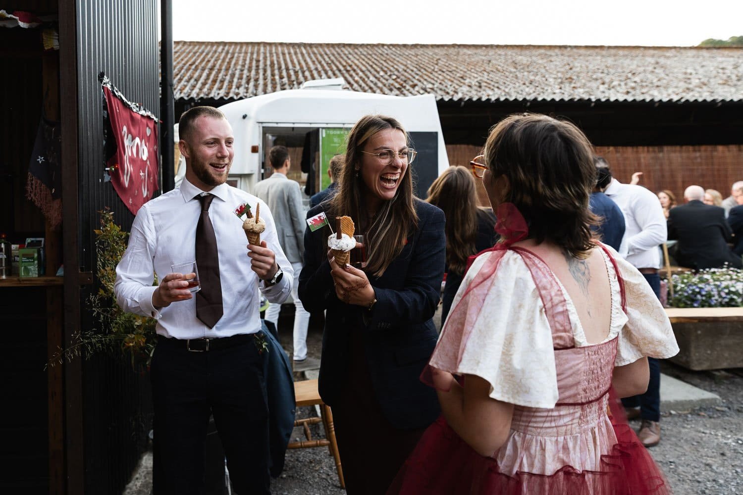 Photography of a yellow DIY wedding in a barn by London photographer Lauren Squire
