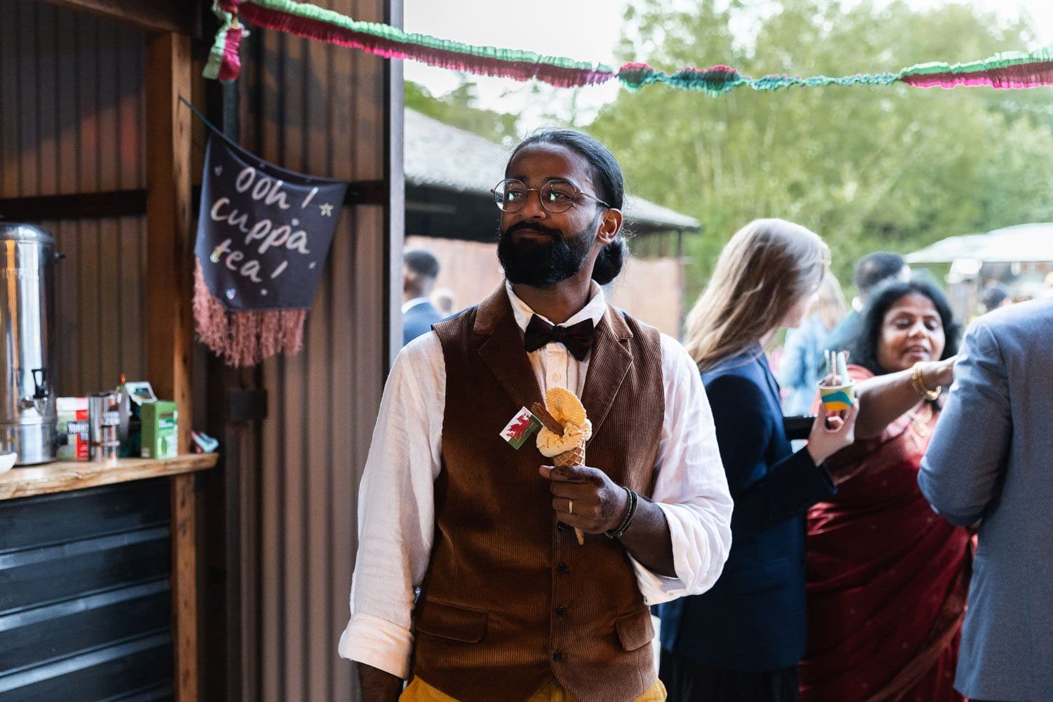 Photography of a yellow DIY wedding in a barn by London photographer Lauren Squire