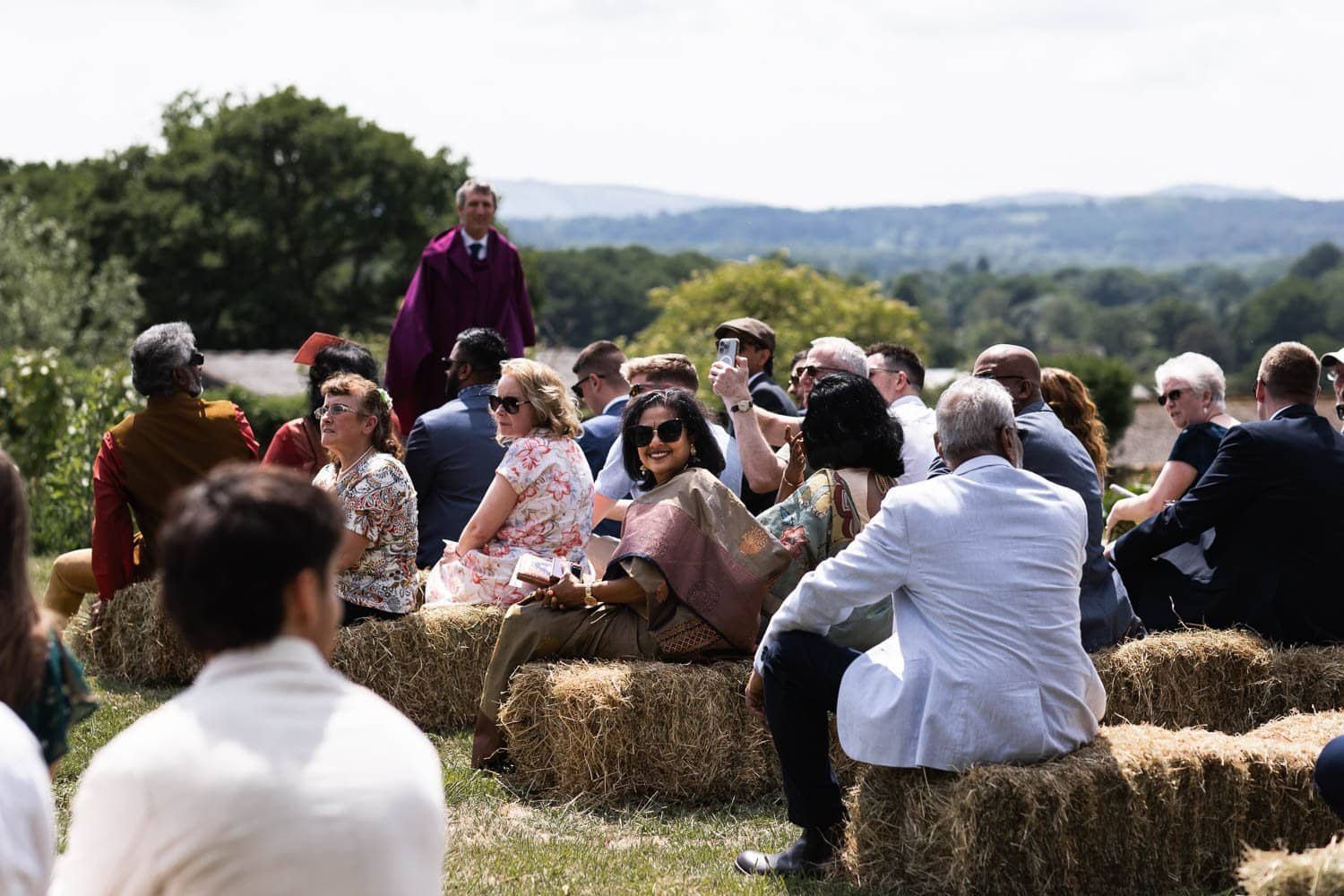 Photography of a yellow DIY wedding in a barn by London photographer Lauren Squire