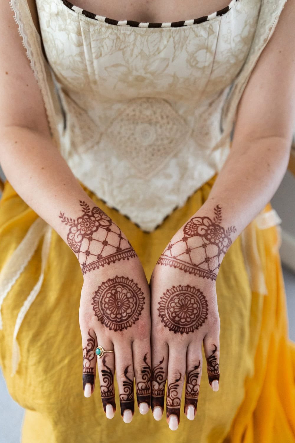 Photography of a yellow DIY wedding in a barn by London photographer Lauren Squire