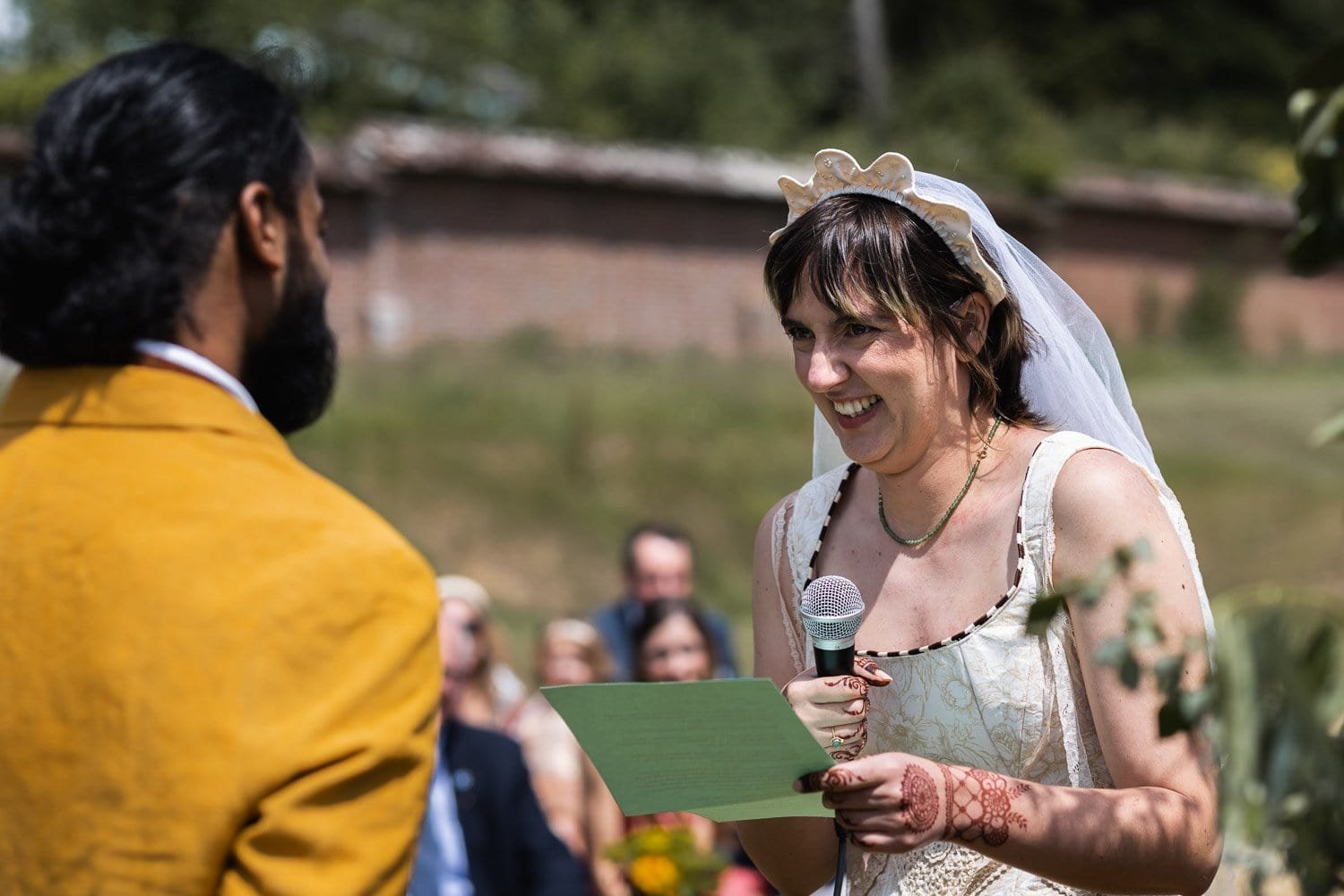 Photography of a yellow DIY wedding in a barn by London photographer Lauren Squire