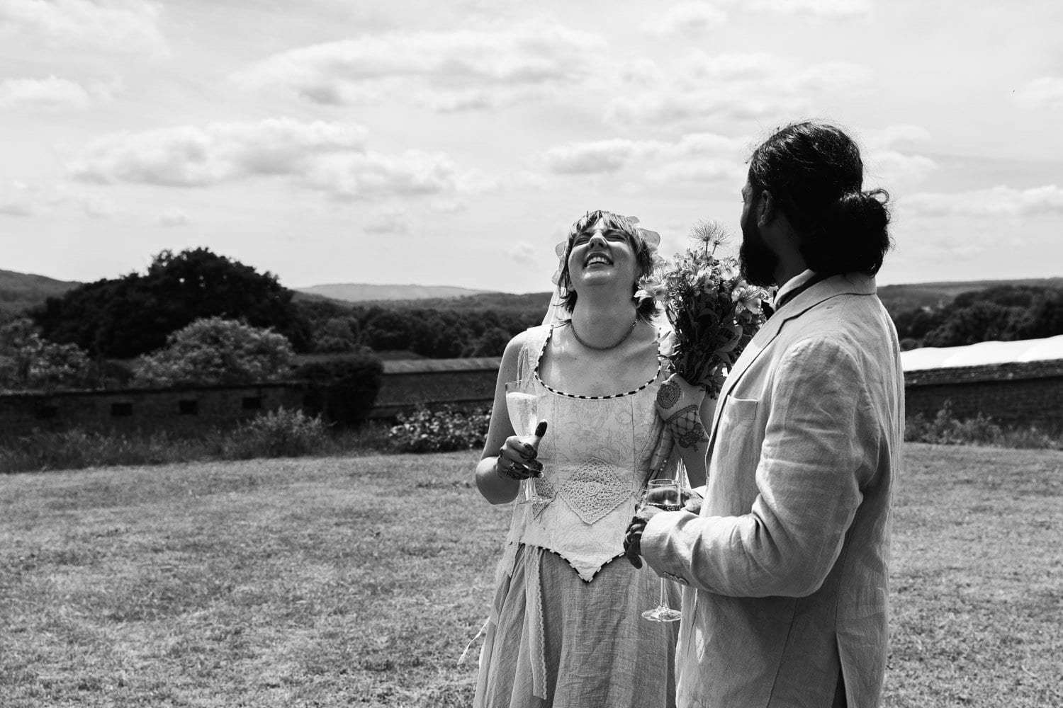 Photography of a yellow DIY wedding in a barn by London photographer Lauren Squire