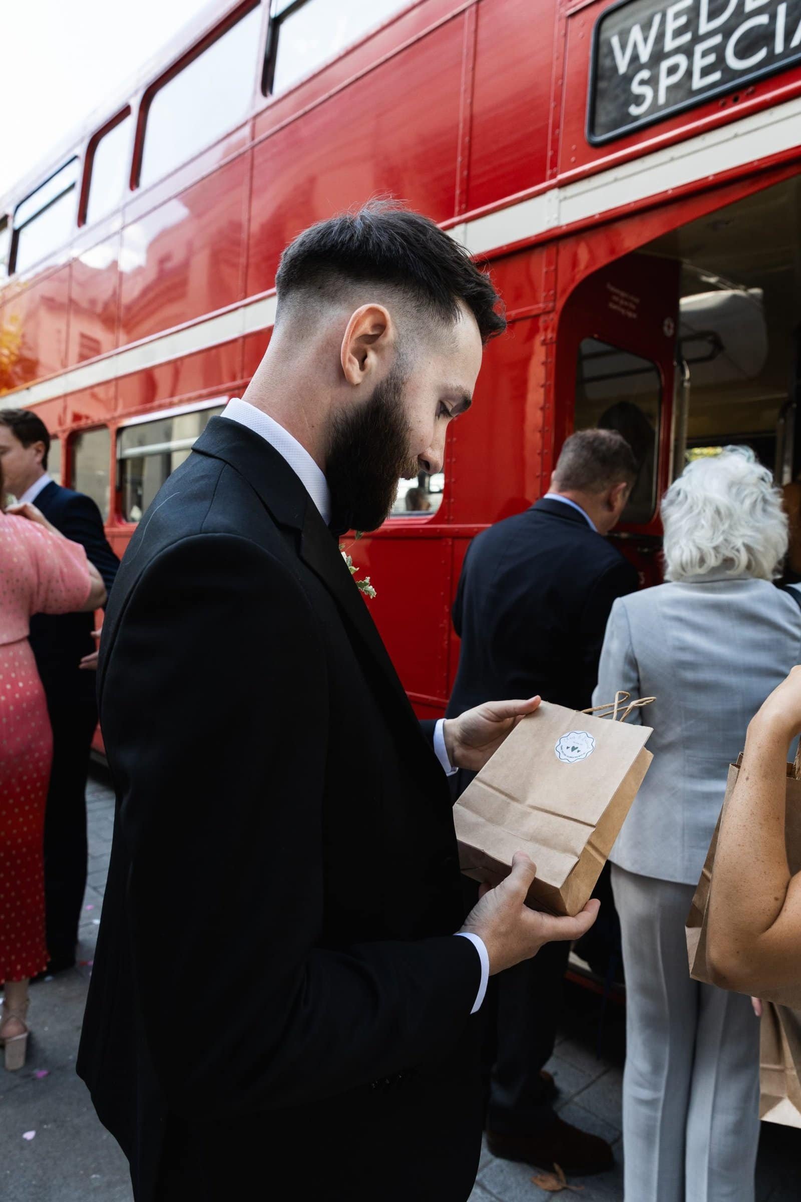 Vintage big red bus hire for London weddings UK - East London Wedding photographer Lauren Squire