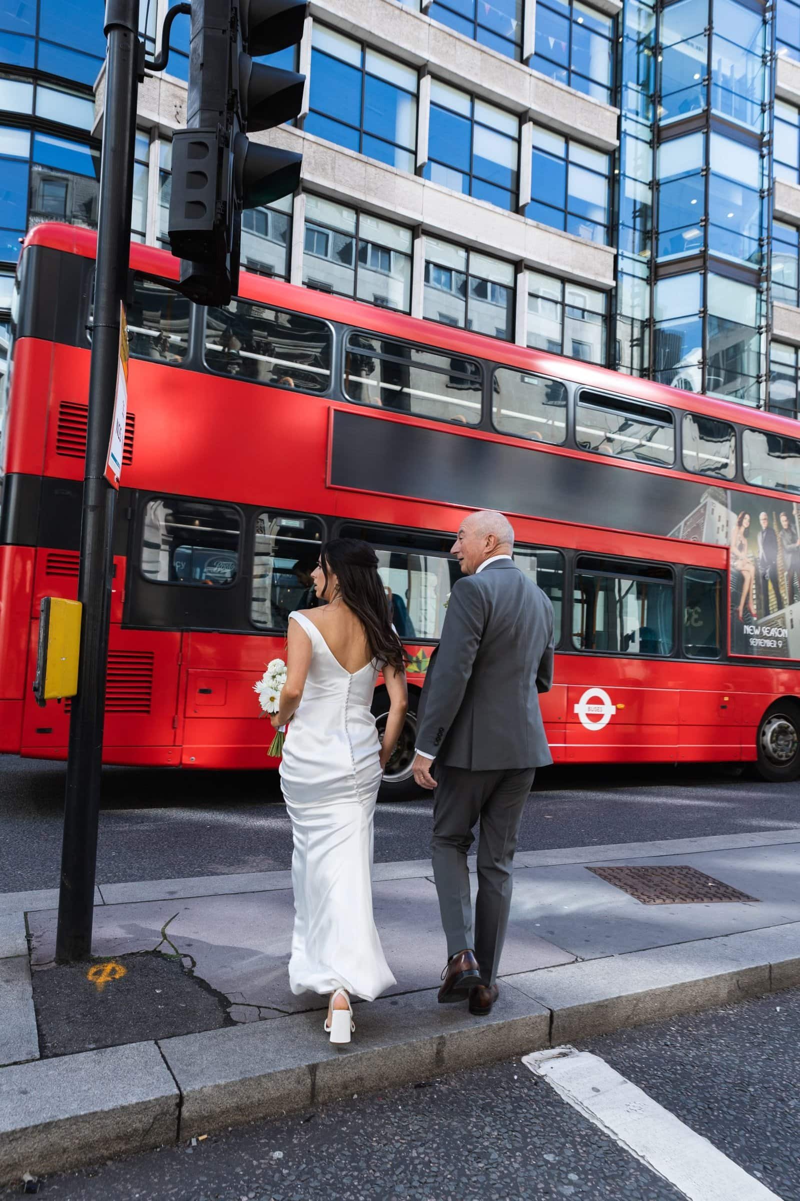 Vintage big red bus hire for London weddings UK - East London Wedding photographer Lauren Squire